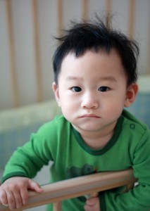http://www.dreamstime.com/stock-images-portrait-sad-asian-boy-crib-image29861734